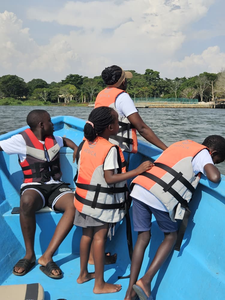 Family boat ride on Lake Victoria