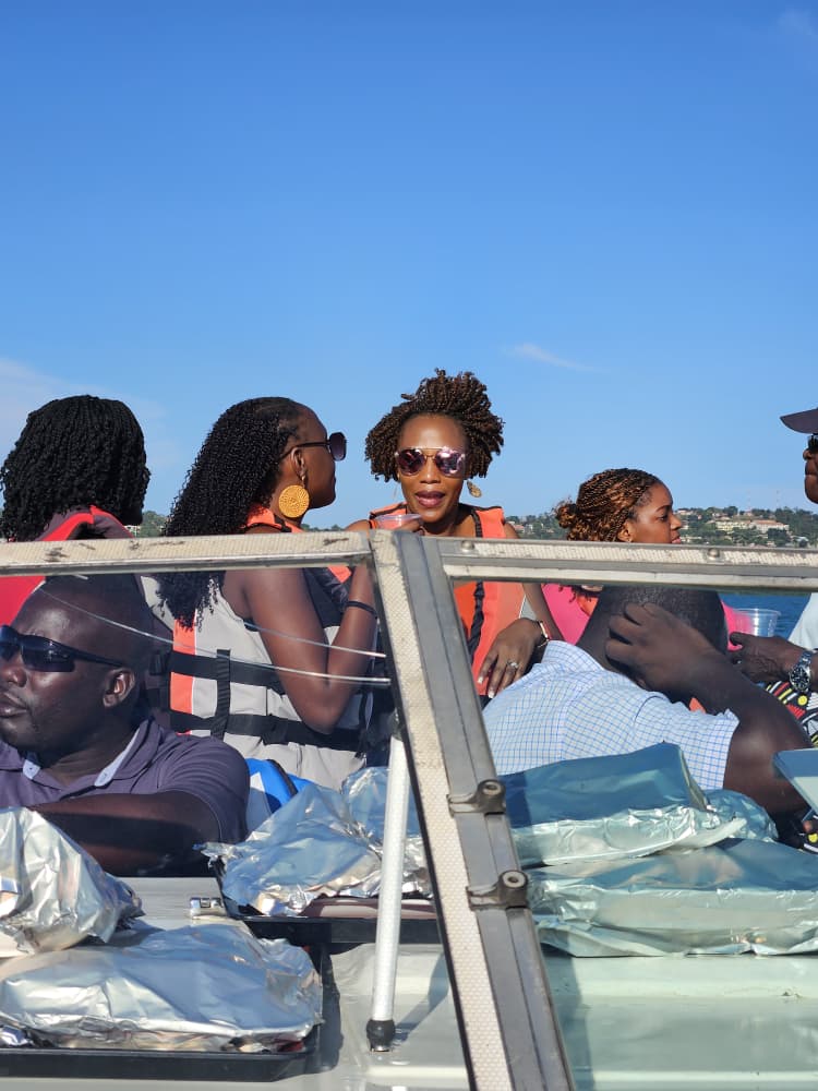 Group of friends enjoying Lake Victoria cruise